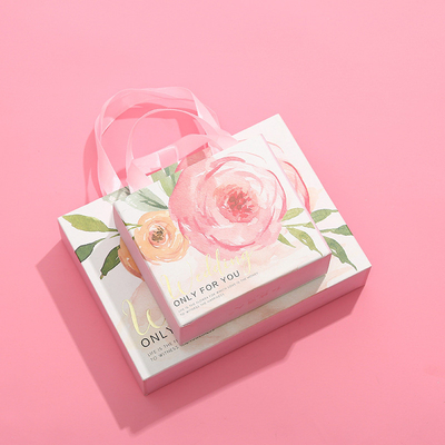 As caixas de presente de joia de seda cor-de-rosa do lenço aumentam caixa dos cosméticos da mão do retângulo